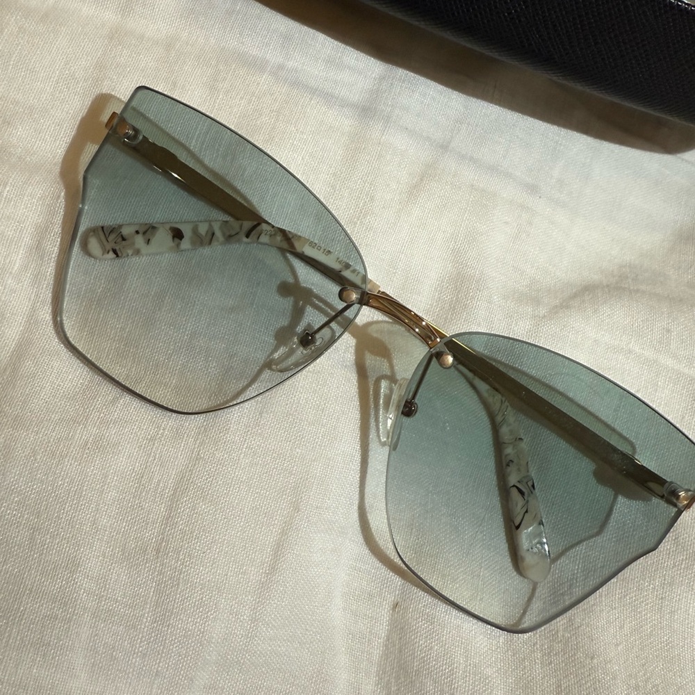 Authentic Salvatore Ferragamo sunglasses.